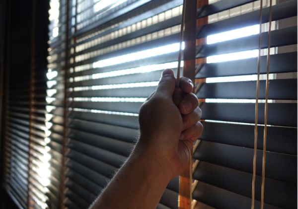 showing How to pull down blinds