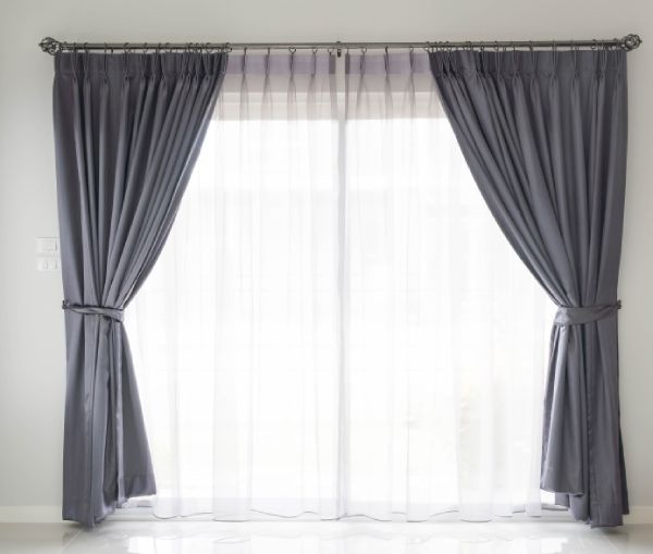 hanging drapes with rings or clips showing How Long Should Drapes Be