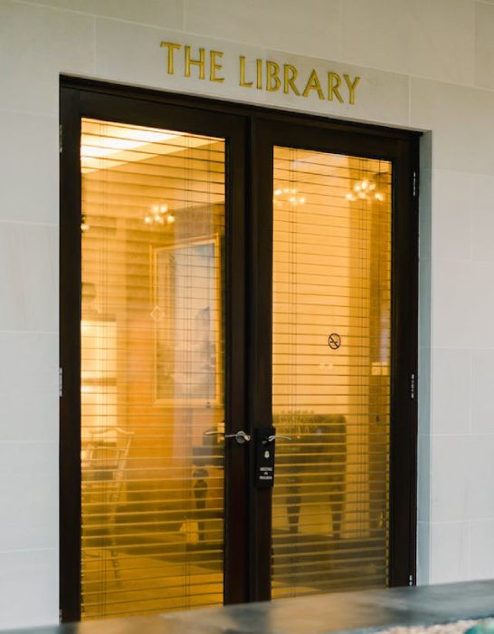 Uneven Built-in Blinds Inside Patio Door of libraray
