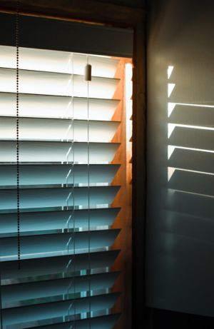 Corded blinds for the glass window.